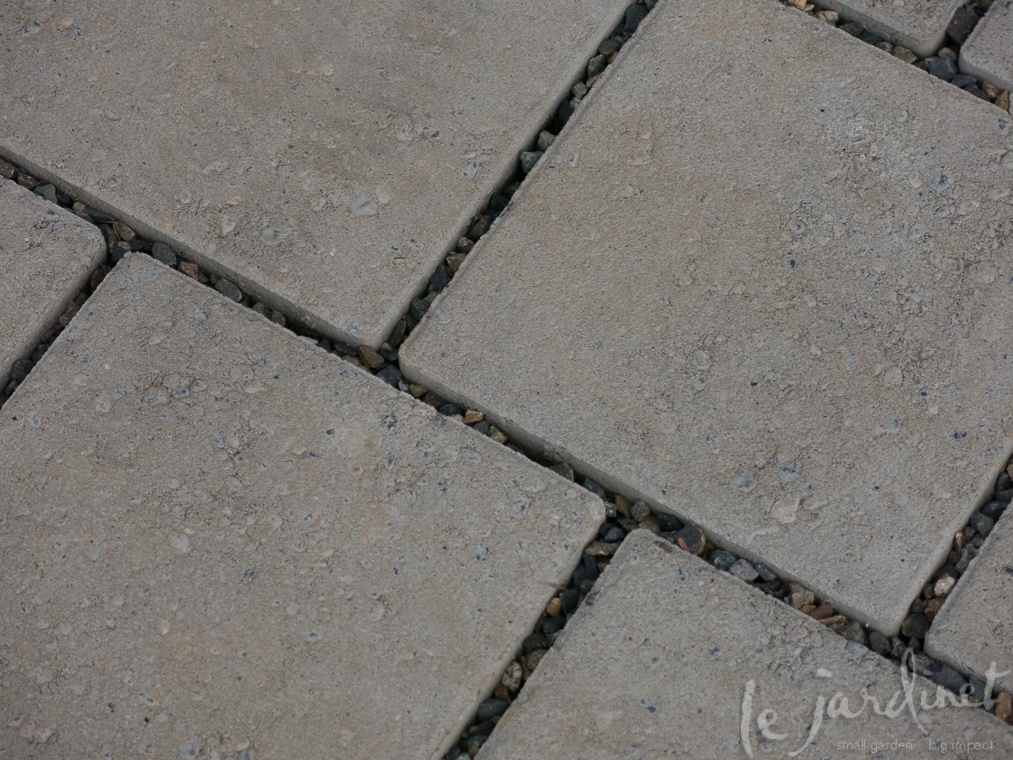 The existing permeable pavers were re-used and expanded
